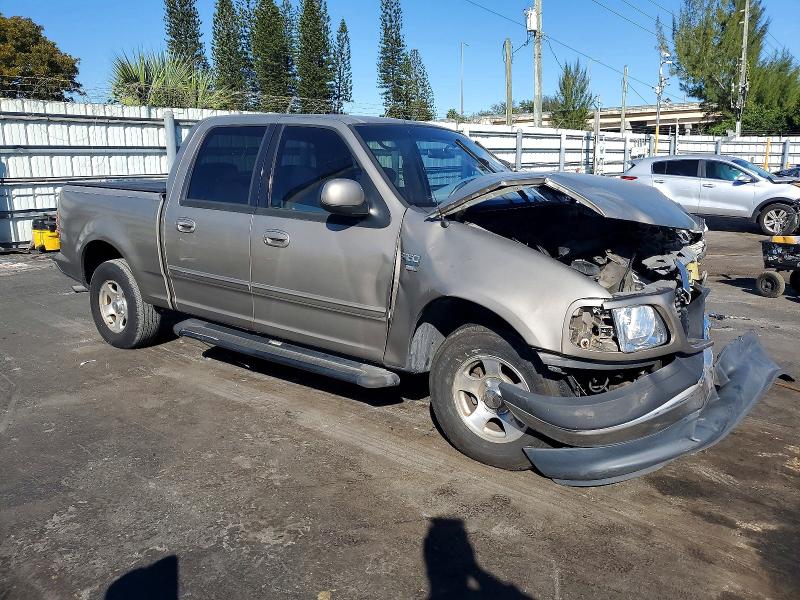 Photo 4 from auction – 2001 FORD F150 with VIN 1FTRW07L71KB57794