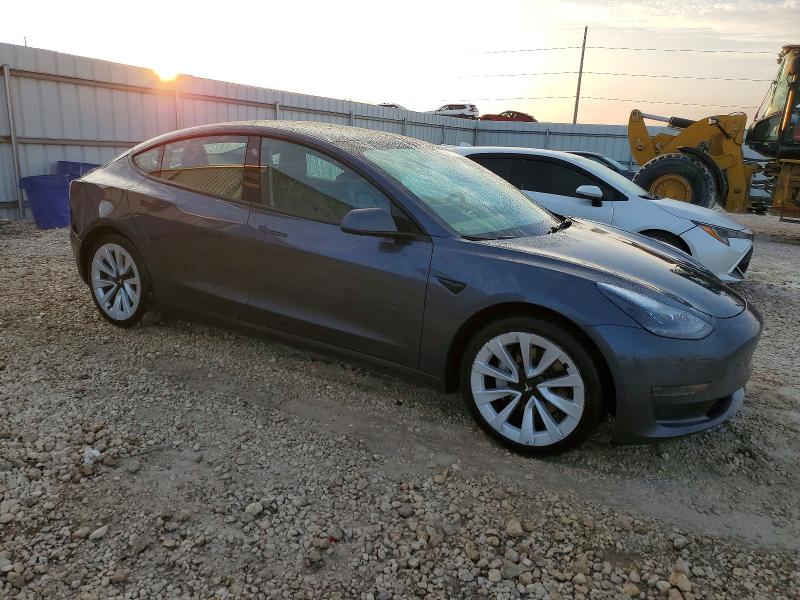 Photo 4 from auction – 2022 TESLA MODEL 3 with VIN 5YJ3E1EA5NF285986