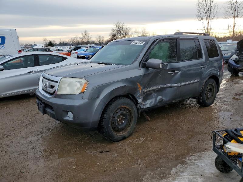 HONDA PILOT TOUR 2011 с VIN 5FNYF4H98BB016642 - Фото с аукциона