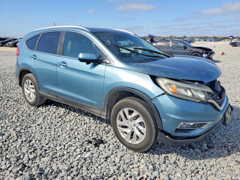 Photo 4 from auction – 2015 HONDA CR-V with VIN 2HKRM3H73FH540114