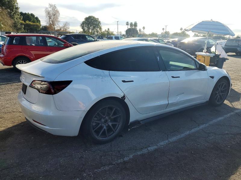 Photo 3 from auction – 2021 TESLA MODEL 3 with VIN 5YJ3E1EA4MF930724
