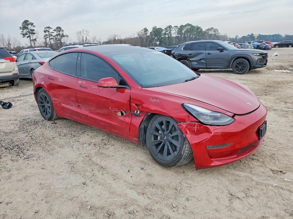 Photo 4 from auction – 2022 TESLA MODEL 3 with VIN 5YJ3E1EA8NF309245