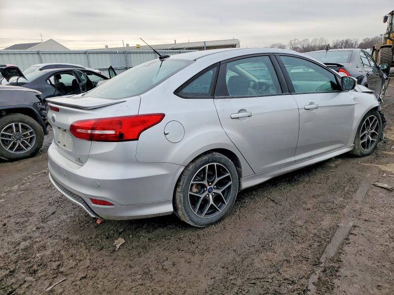 Photo 3 from auction – 2016 FORD FOCUS with VIN 1FADP3F27GL280537