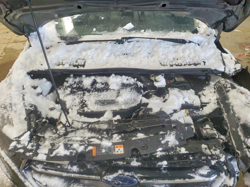 Foto 12 de la subasta – 2017 FORD ESCAPE con VIN 1FMCU9J96HUE77485