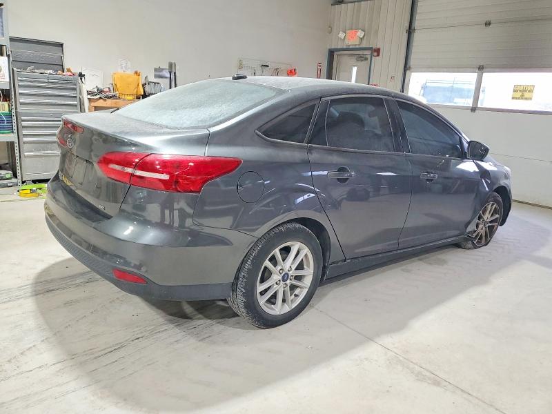Photo 3 from auction – 2018 FORD FOCUS with VIN 1FADP3F21JL202407