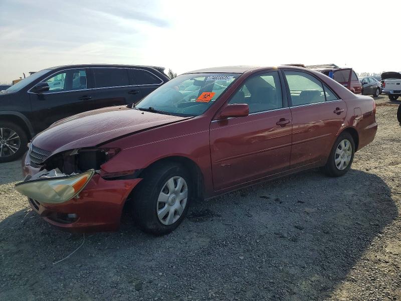 TOYOTA CAMRY 2002 with VIN JTDBE32K720093483 - Photo from auction