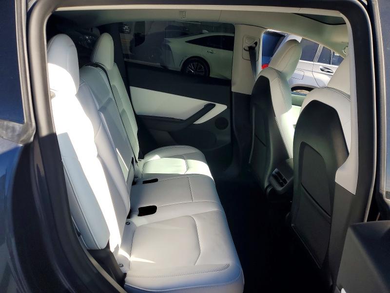 Photo 11 from auction – 2022 TESLA MODEL Y with VIN 7SAYGDEF8NF492114