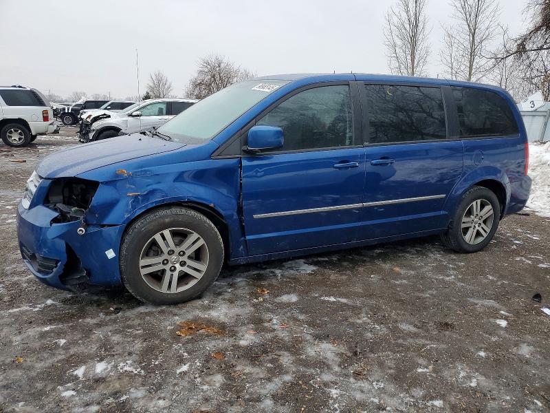 DODGE GRAND CARA 2010 with VIN 2D4RN4DX0AR123055 - Photo from auction