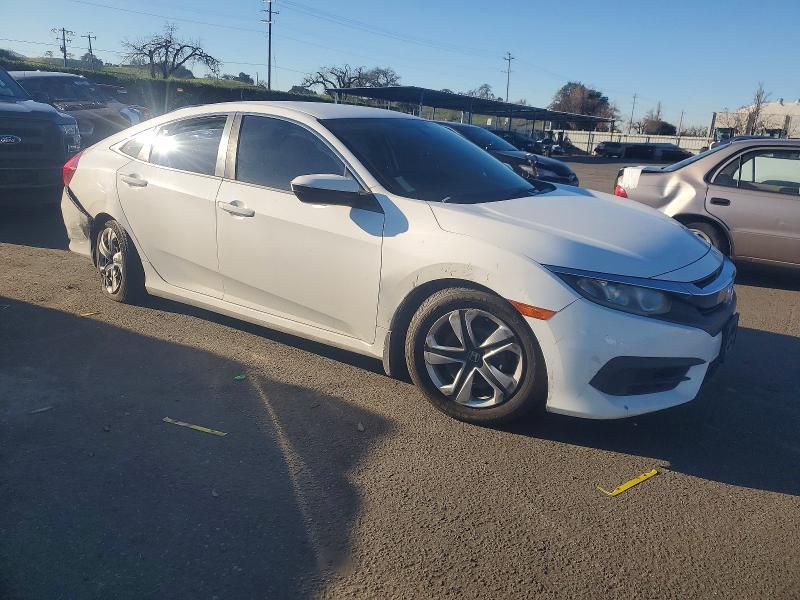 Photo 4 from auction – 2016 HONDA CIVIC LX with VIN 2HGFC2F50GH566201