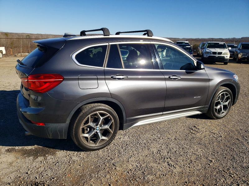 Photo 3 from auction – 2017 BMW X1 with VIN WBXHT3Z32H4A65273