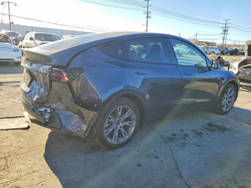 Photo 3 from auction – 2023 TESLA MODEL Y with VIN 7SAYGDED2PF967046
