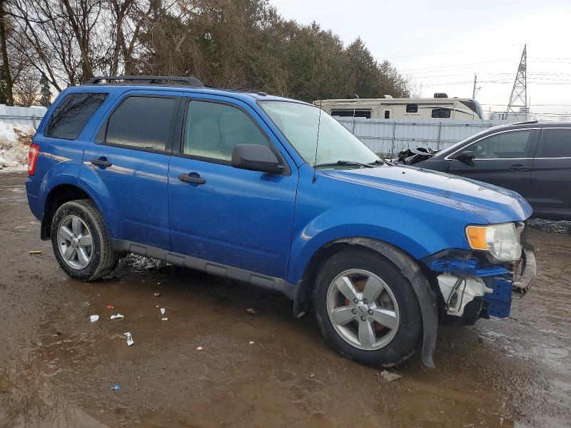 Photo 4 from auction – 2011 FORD ESCAPE with VIN 1FMCU0DG0BKC67246