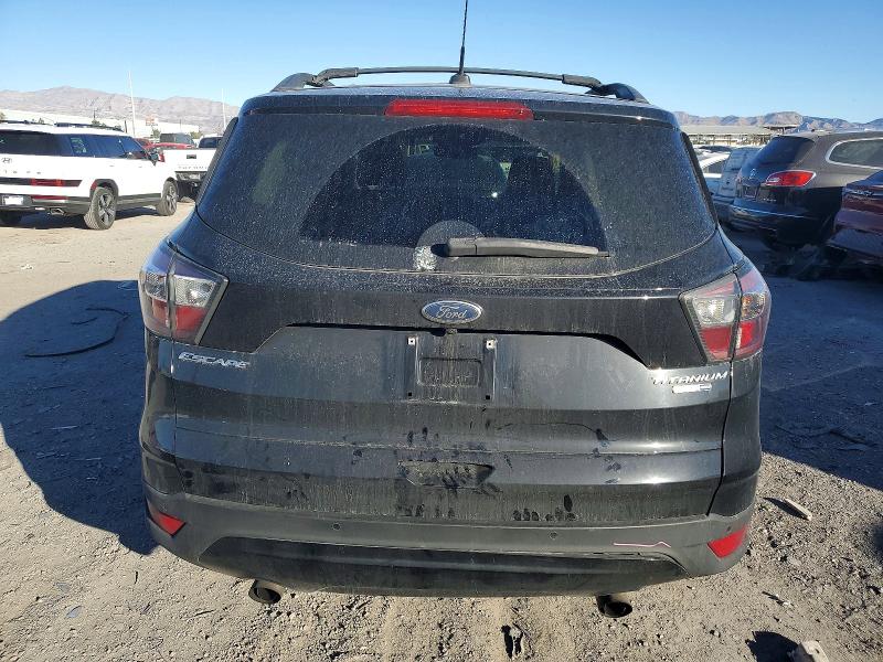 Photo 6 from auction – 2017 FORD ESCAPE TIT with VIN 1FMCU9JD8HUA78372