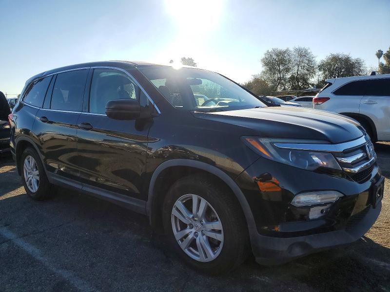 Photo 4 from auction – 2018 HONDA PILOT LX with VIN 5FNYF5H12JB016215