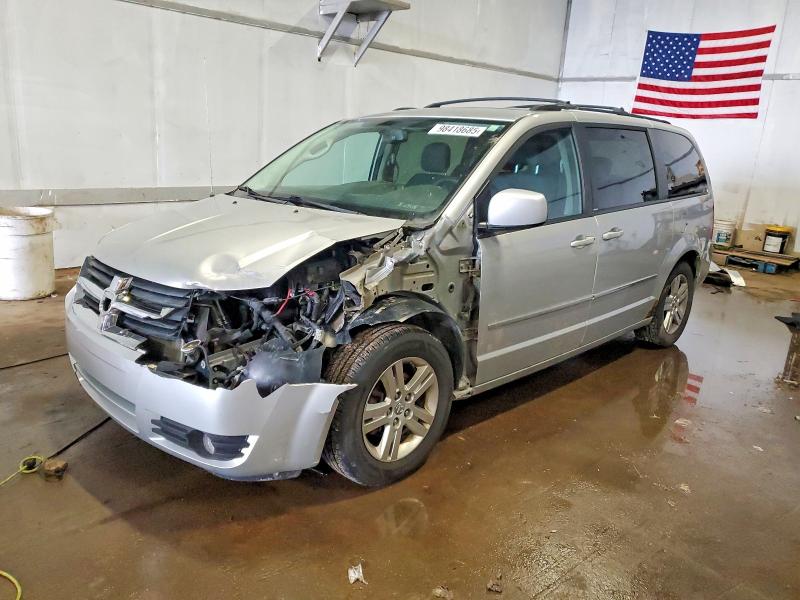 DODGE GRAND CARAVAN 2010 with VIN 2D4RN6DX6AR336720 - Photo from auction