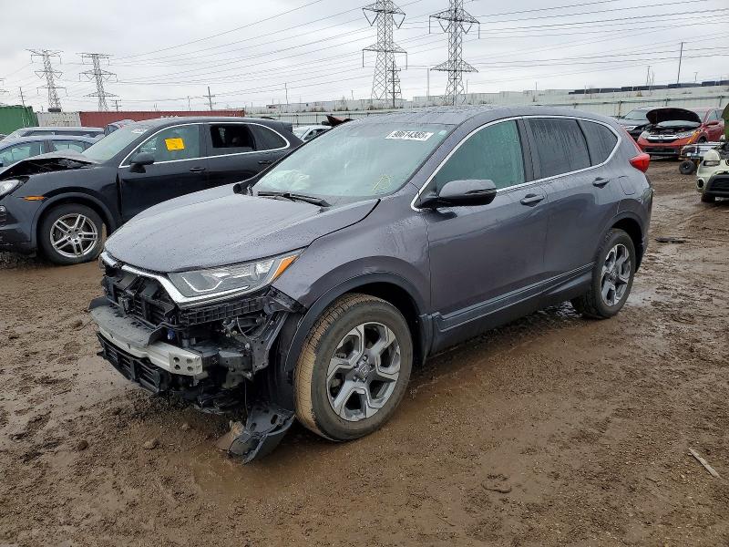 HONDA CRV 2018 with VIN 7FARW2H52JE006052 - Photo from auction