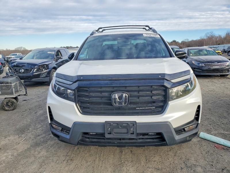 Photo 5 from auction – 2021 HONDA RIDGELINE with VIN 5FPYK3F85MB020240