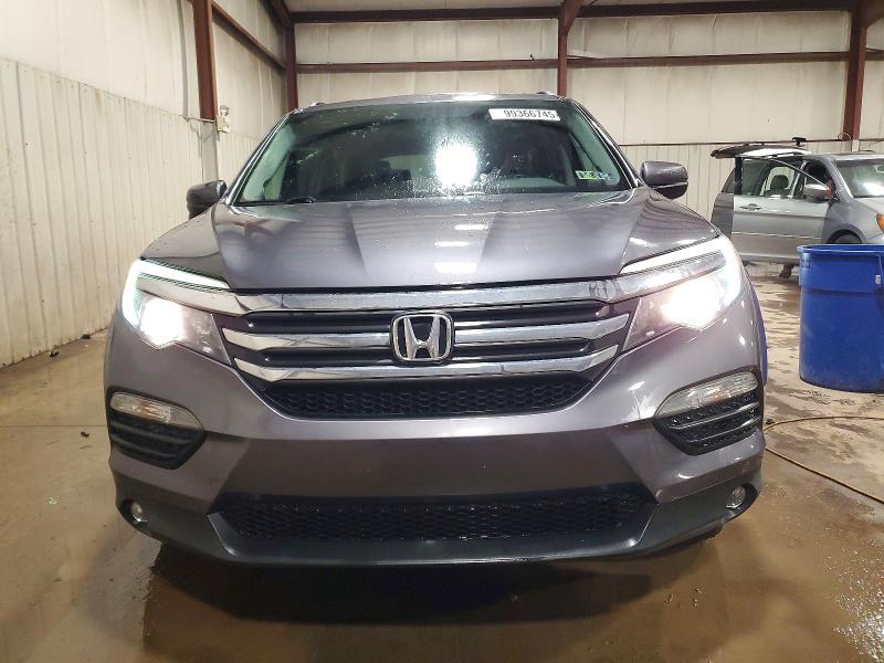Photo 5 from auction – 2016 HONDA PILOT EXL with VIN 5FNYF6H52GB022890