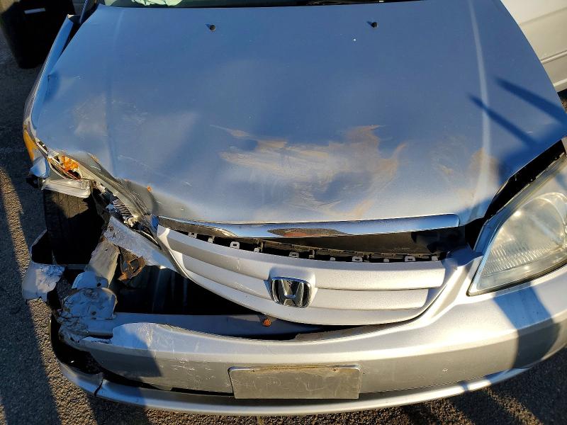 Photo 11 from auction – 2003 HONDA CIVIC LX with VIN 2HGES16543H518977