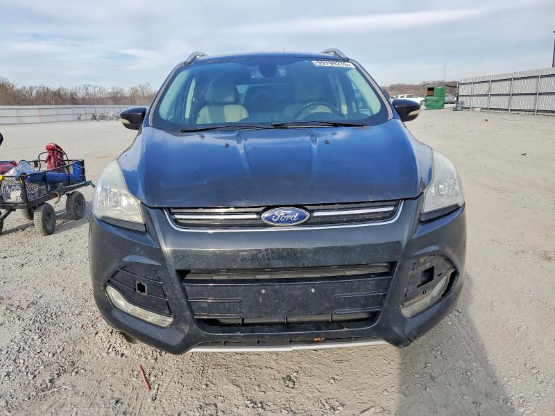 Photo 5 from auction – 2014 FORD ESCAPE TIT with VIN 1FMCU9JX9EUB19923