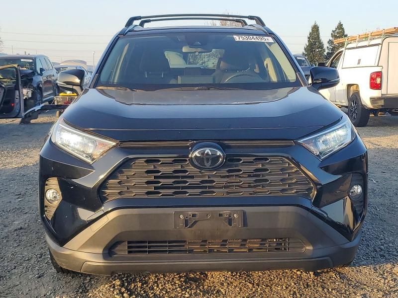 Photo 5 from auction – 2019 TOYOTA RAV4 XLE with VIN JTMW1RFV9KD024369