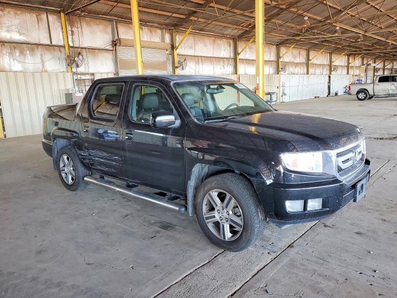 Photo 4 from auction – 2011 HONDA RIDGELINE with VIN 5FPYK1F56BB003809
