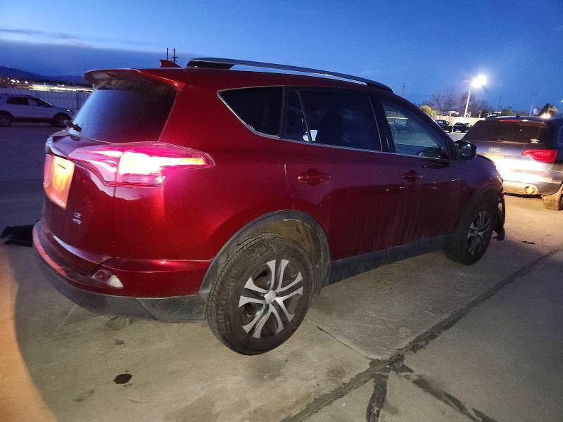 Photo 3 from auction – 2018 TOYOTA RAV4 LE with VIN JTMBFREVXJD227125