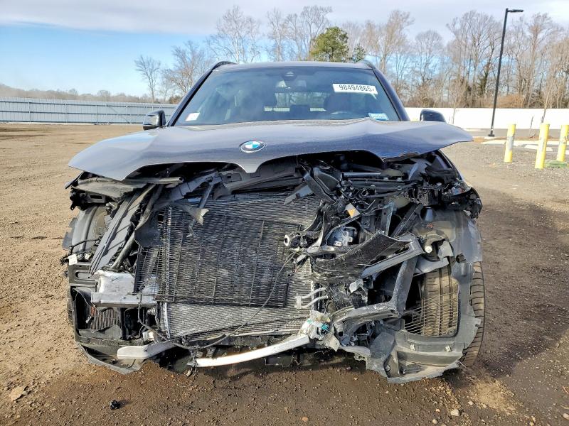 Photo 5 from auction – 2022 BMW X5 XDRIVE4 with VIN 5UXCR6C03N9N07154