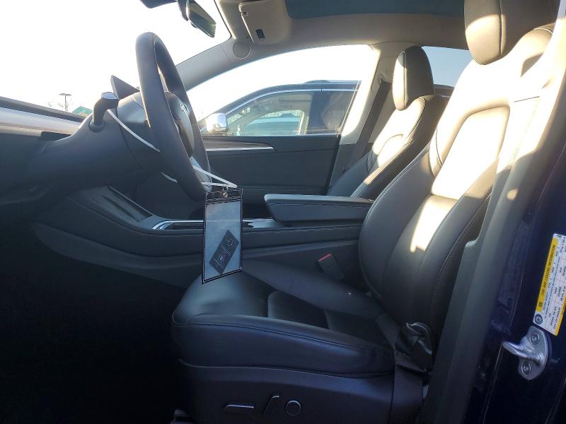 Photo 7 from auction – 2023 TESLA MODEL Y with VIN 7SAYGDEE0PA115686