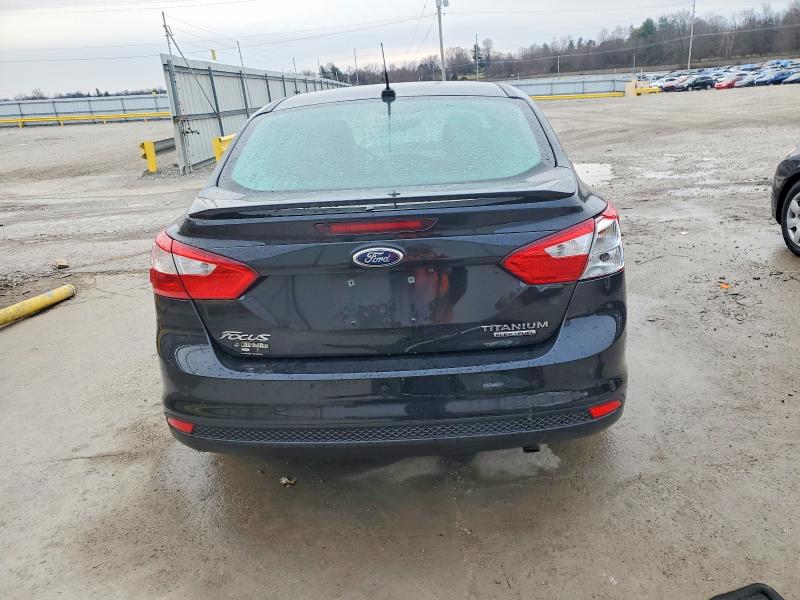 Photo 6 from auction – 2014 FORD FOCUS TITA with VIN 1FADP3J25EL235214