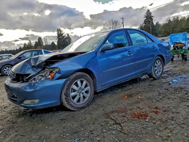 TOYOTA CAMRY LE 2004 with VIN 4T1BF32K44U576899 - Photo from auction