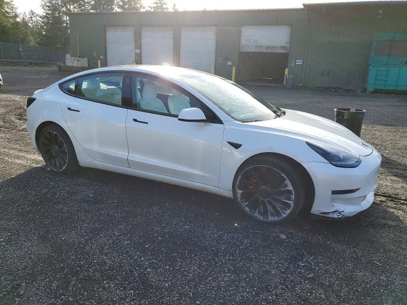 Photo 4 from auction – 2022 TESLA MODEL 3 with VIN 5YJ3E1EC5NF361174