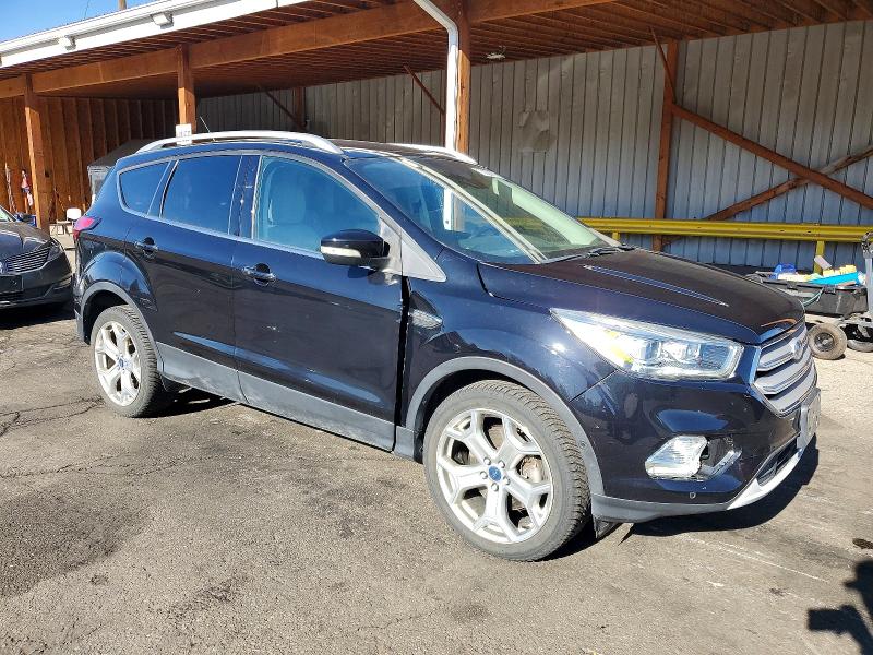 Photo 4 from auction – 2019 FORD ESCAPE TIT with VIN 1FMCU9J98KUC29617