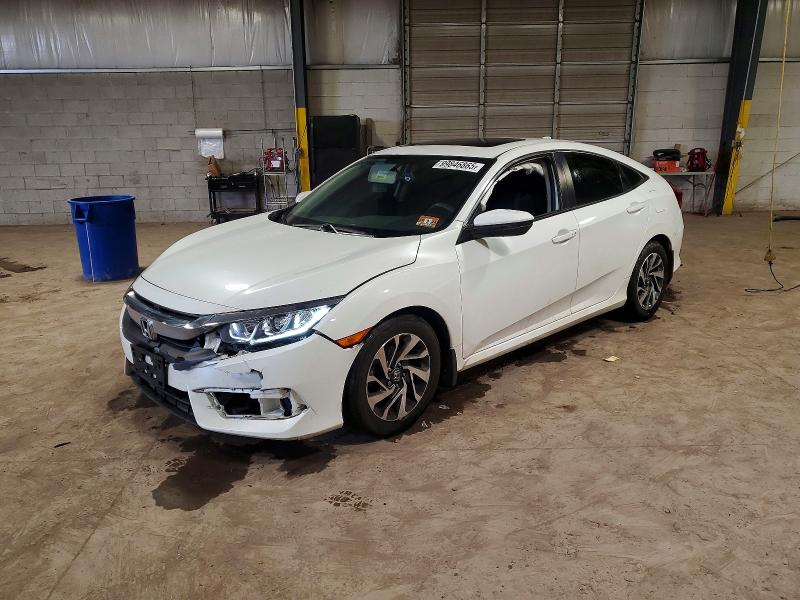 HONDA CIVIC EX 2017 with VIN 2HGFC2F7XHH574499 - Photo from auction