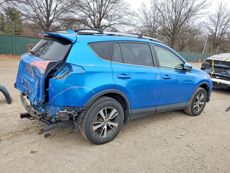 Photo 3 from auction – 2017 TOYOTA RAV4 XLE with VIN JTMRFREVXHJ111594