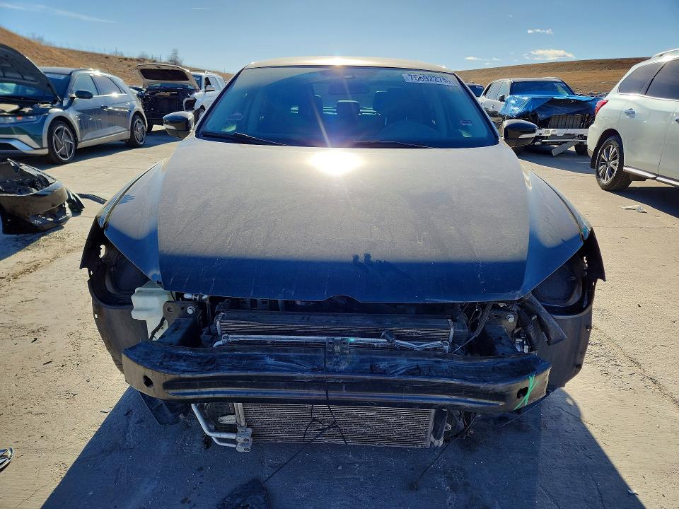 Photo 5 from auction – 2014 VOLKSWAGEN PASSAT S with VIN 1VWAT7A3XEC068242