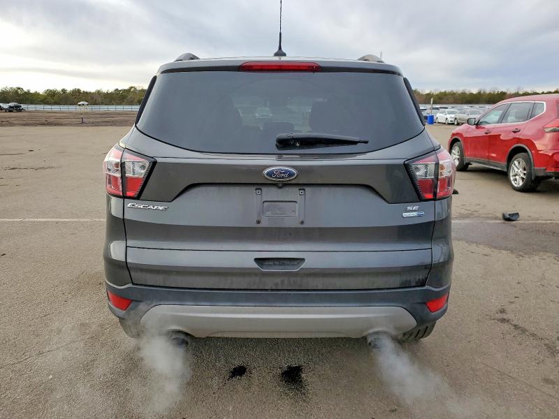Photo 6 from auction – 2018 FORD ESCAPE SE with VIN 1FMCU9GD1JUC53641