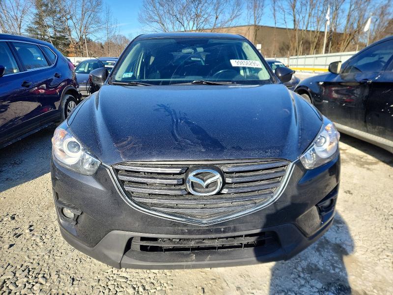 Photo 5 from auction – 2016 MAZDA CX-5 TOURI with VIN JM3KE4CY5G0919495