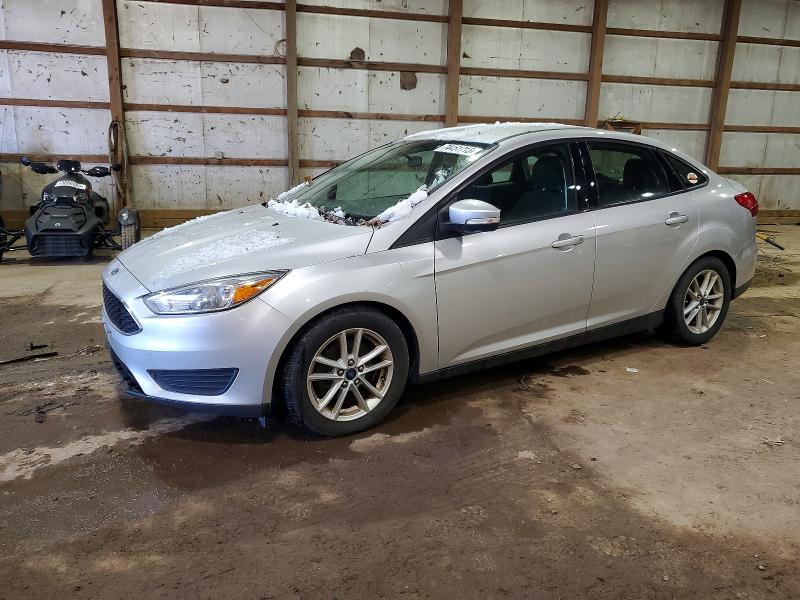 FORD FOCUS 2015 with VIN 1FADP3F24FL355533 - Photo from auction