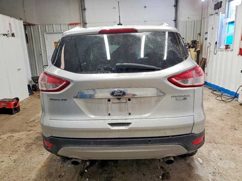 Photo 6 from auction – 2014 FORD ESCAPE with VIN 1FMCU9J99EUD12896