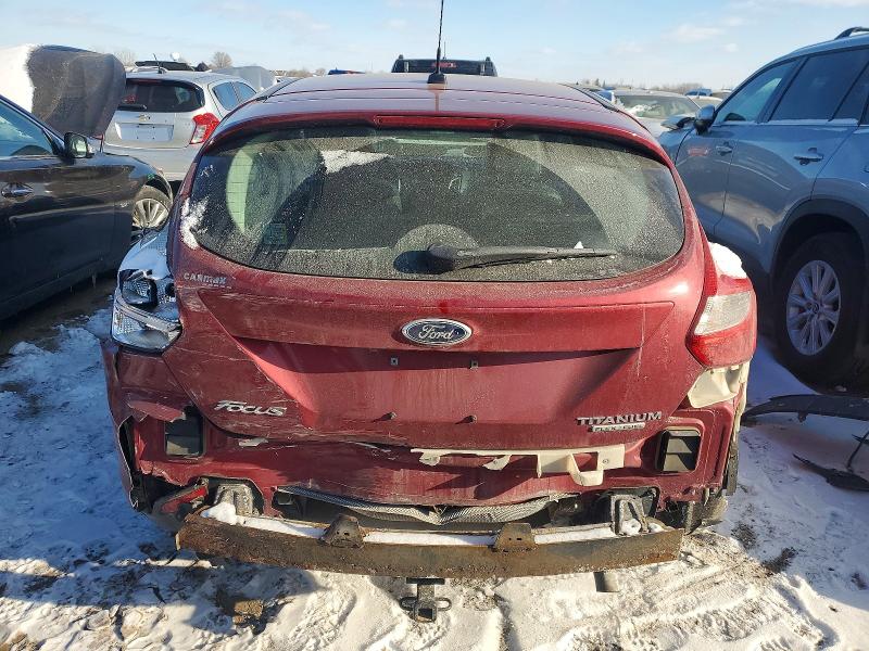 Photo 6 from auction – 2014 FORD FOCUS with VIN 1FADP3N21EL192890
