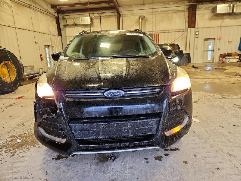 Photo 5 from auction – 2016 FORD ESCAPE SE with VIN 1FMCU9G91GUC63204