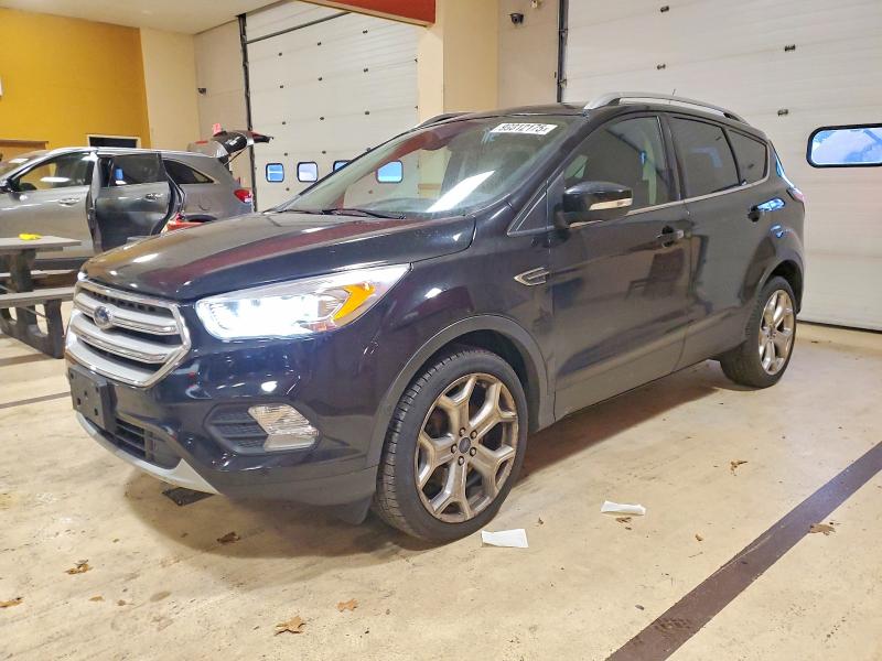 FORD ESCAPE 2018 with VIN 1FMCU9J90JUB92531 - Photo from auction