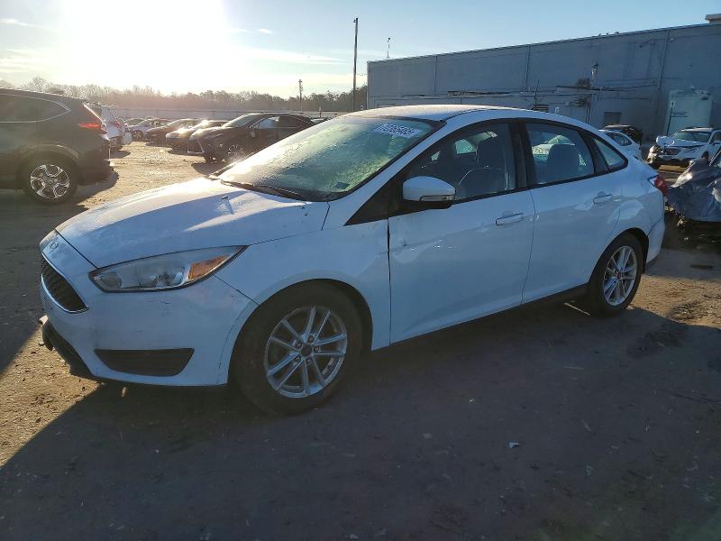 FORD FOCUS SE 2016 with VIN 1FADP3FE0GL237040 - Photo from auction