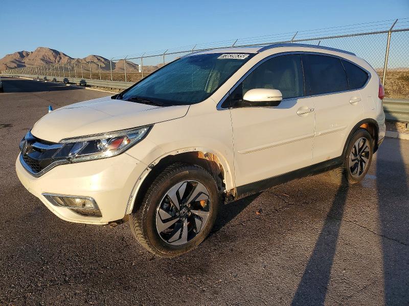 HONDA CR-V TOURI 2015 z numerem VIN 5J6RM4H98FL096399 - Zdjęcie z aukcji