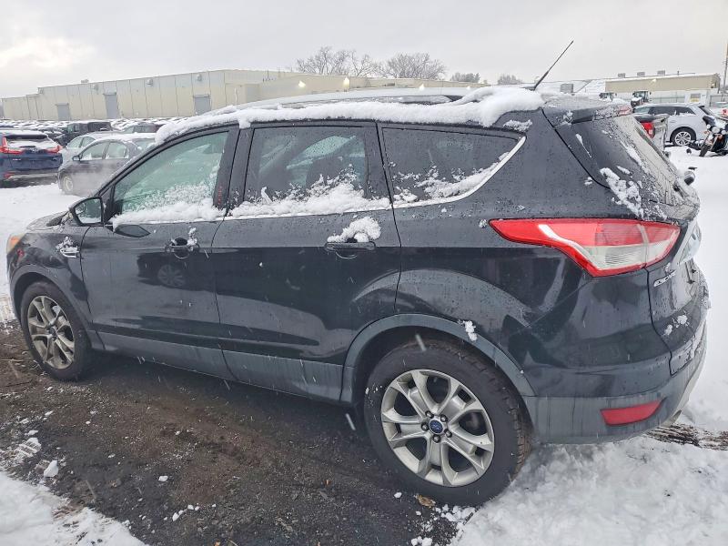 Photo 2 from auction – 2014 FORD ESCAPE TIT with VIN 1FMCU9JX5EUE45377