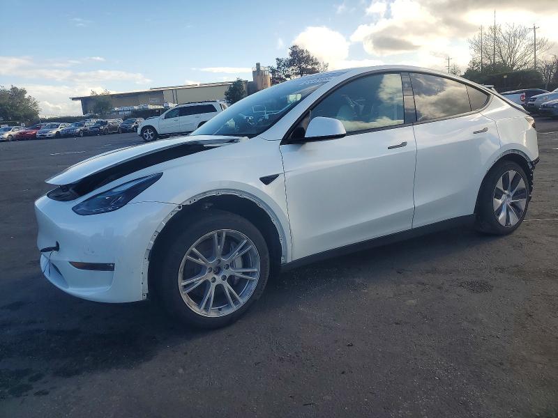 TESLA MODEL Y 2023 with VIN 7SAYGDEE9PF824099 - Photo from auction