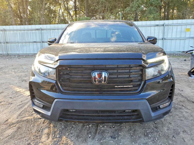 Photo 5 from auction – 2022 HONDA RIDGELINE with VIN 5FPYK3F86NB004467
