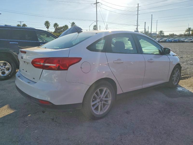 Foto 3 de la subasta – 2018 FORD FOCUS SE con VIN 1FADP3F23JL327795