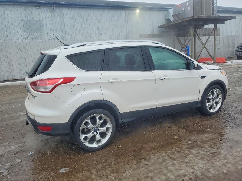 Photo 3 from auction – 2016 FORD ESCAPE TIT with VIN 1FMCU9J94GUB22815